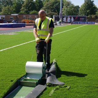 tape edges, Brushing artificial pitch, synthetic turf installation, grass, hybrid