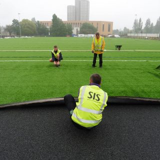 Brushing artificial pitch, synthetic turf installation, grass, hybrid