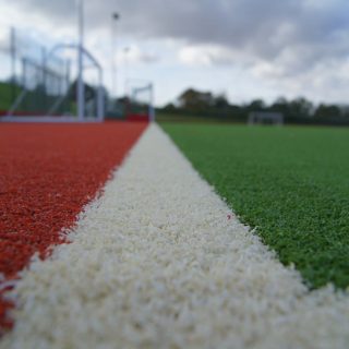 red pitch, white lines, green grass, SISTurf Hockey SISTurf, synthetic, pitch, sand dressed, fields,